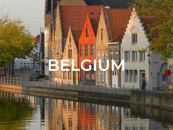 Category selection image that says "Belgium" with a photo of some colourful houses along a canal.
