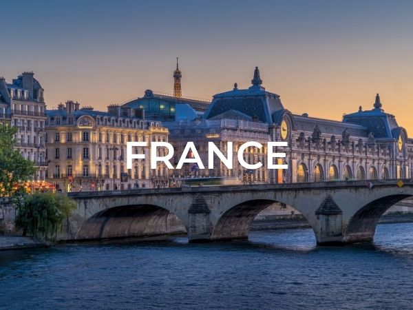 Category selection image that says "France" with a photo of a pretty bridge in Paris.